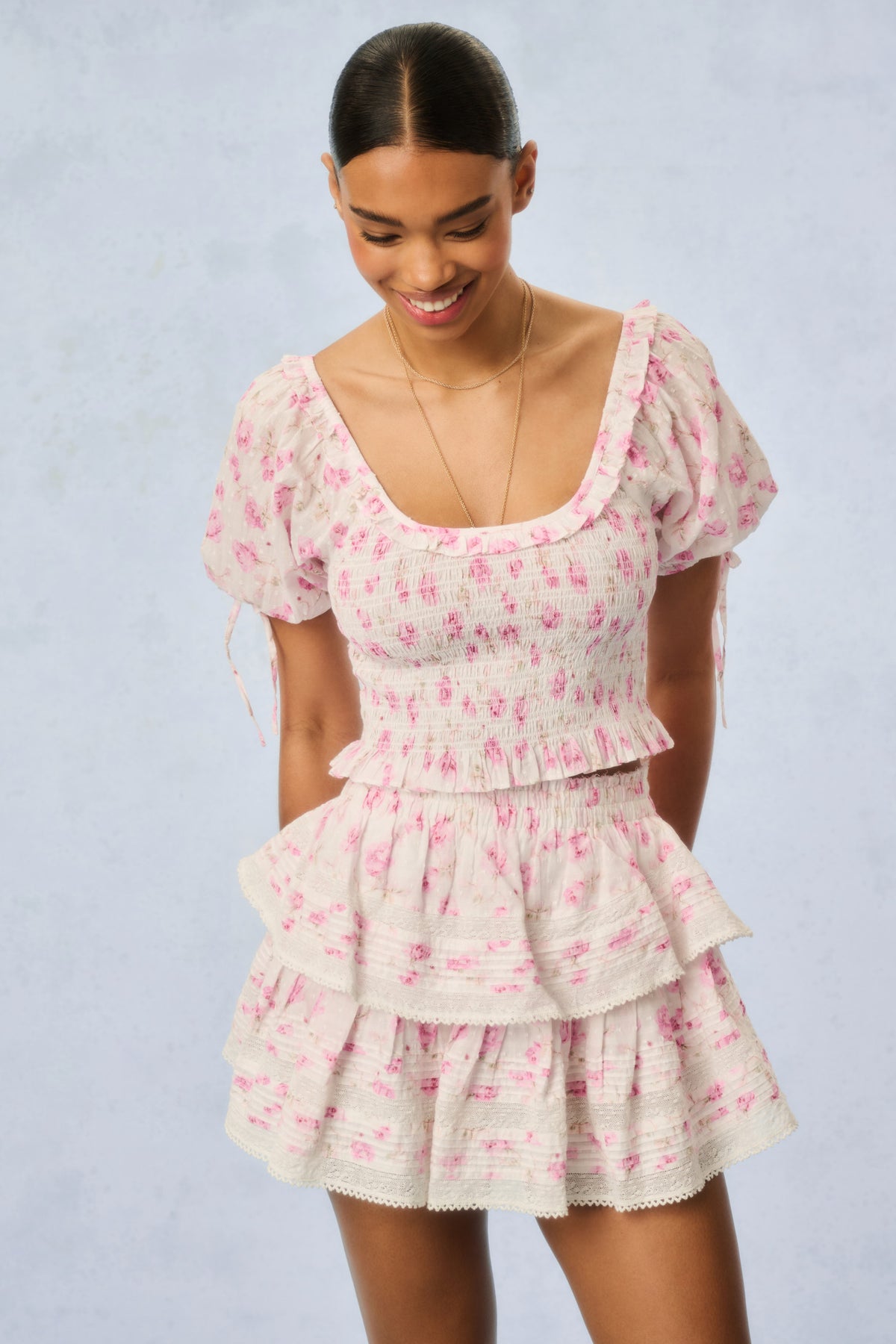 Pink floral smocked short-sleeve tiered mini dress with ruffled skirt