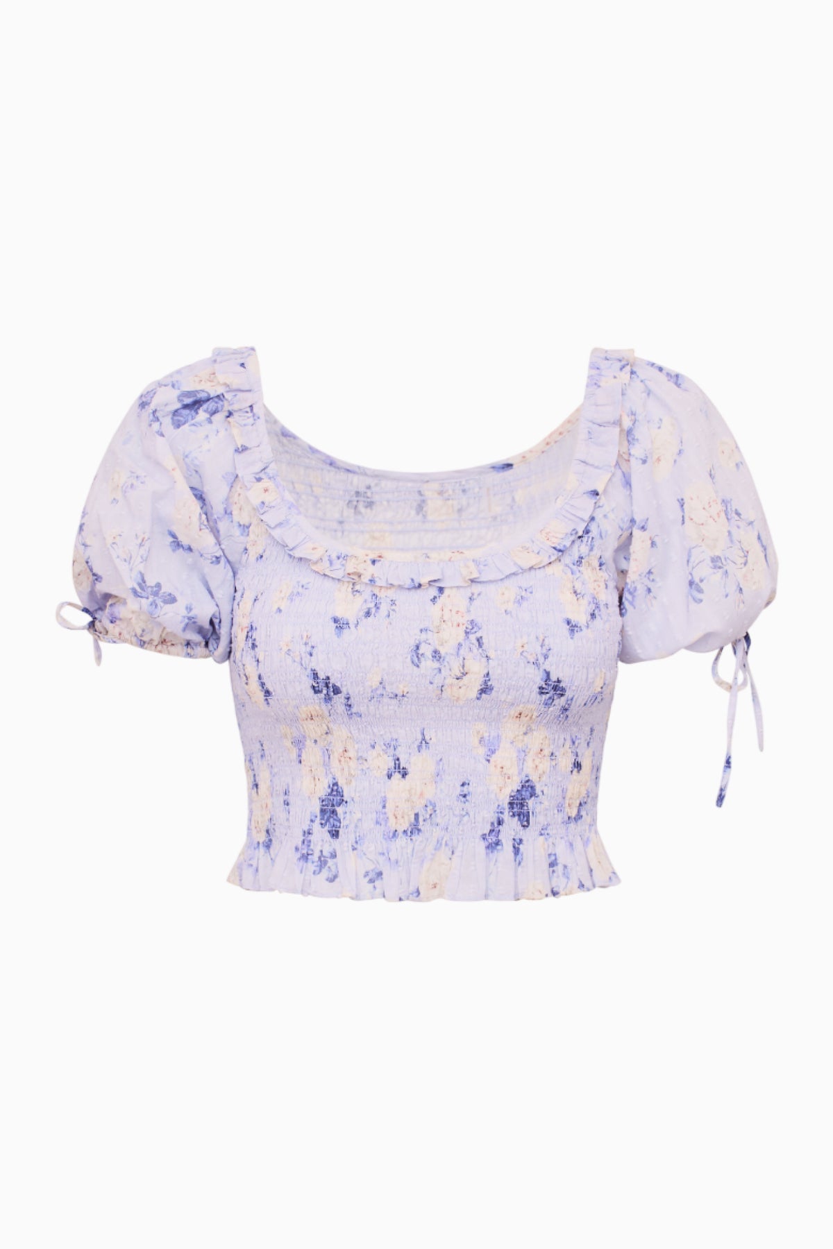 Light blue printed smocked peplum top with puff sleeves and side tie details