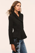 Black tweed peplum jacket with notched lapel and long sleeves, fitted waist