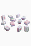 Assorted pastel mahjong tiles with floral and decorative symbol faces