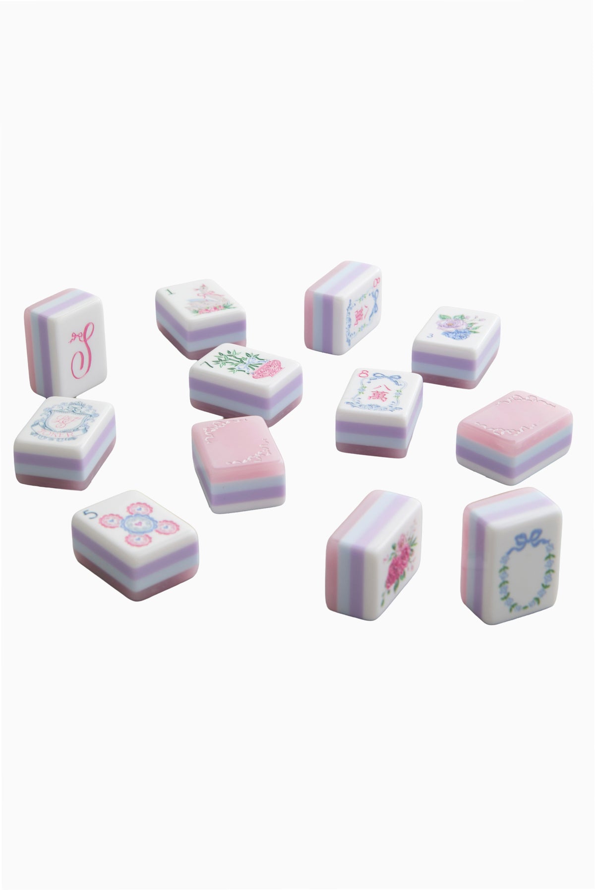 Assorted pastel mahjong tiles with floral and decorative symbol faces