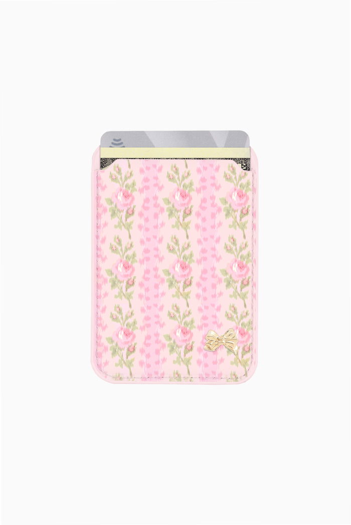 Pink floral magnetic phone wallet case with top card holder and gold bow detail