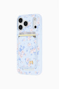 MagSafe magnetic wallet phone case with light blue floral rosette pattern and gold flap