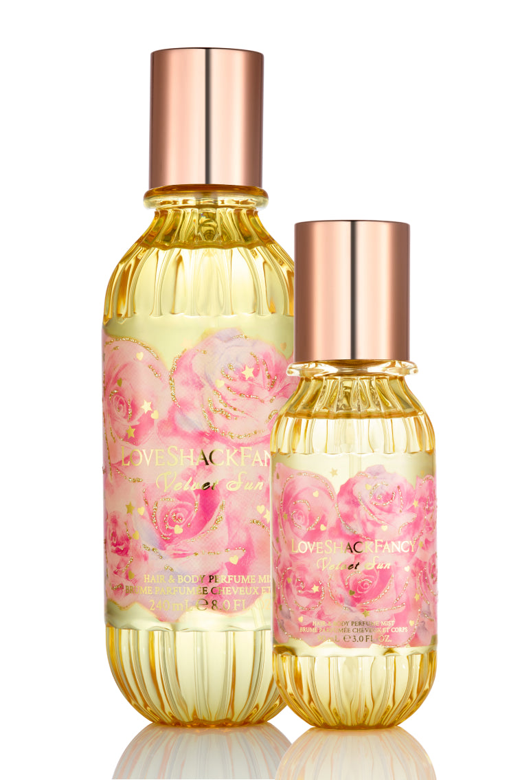 Mini hair and body mist bottle set with rose-gold caps, gold glass, pink floral labels