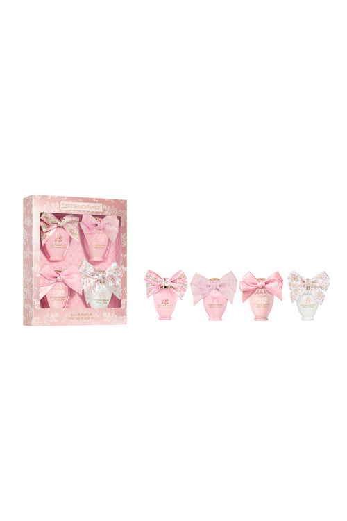 Mini perfume bottles set in pink gift box with bow decorations