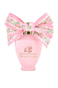 LoveShackFancy mini eau de parfum bottle with large floral bow, pink glass
