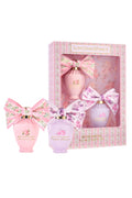 LoveShackFancy mini eau de parfum set with three bottles and ribbon bows, floral pink