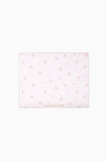 Pink and white ditsy mouse pad with light floral pattern and stitched border