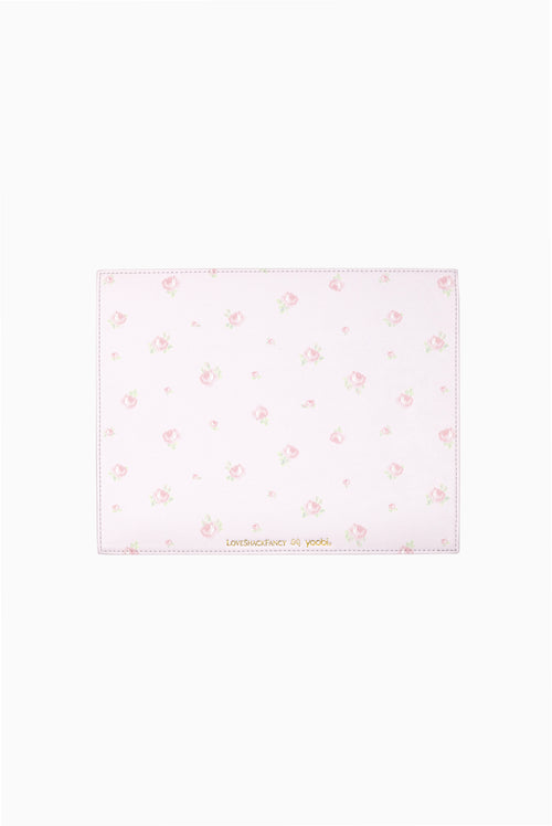 Pink and white ditsy mouse pad with light floral pattern and stitched border