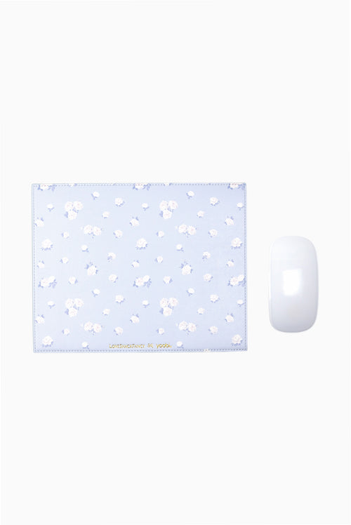 Light blue floral rosette mouse pad with stitched border and small blue/white mouse