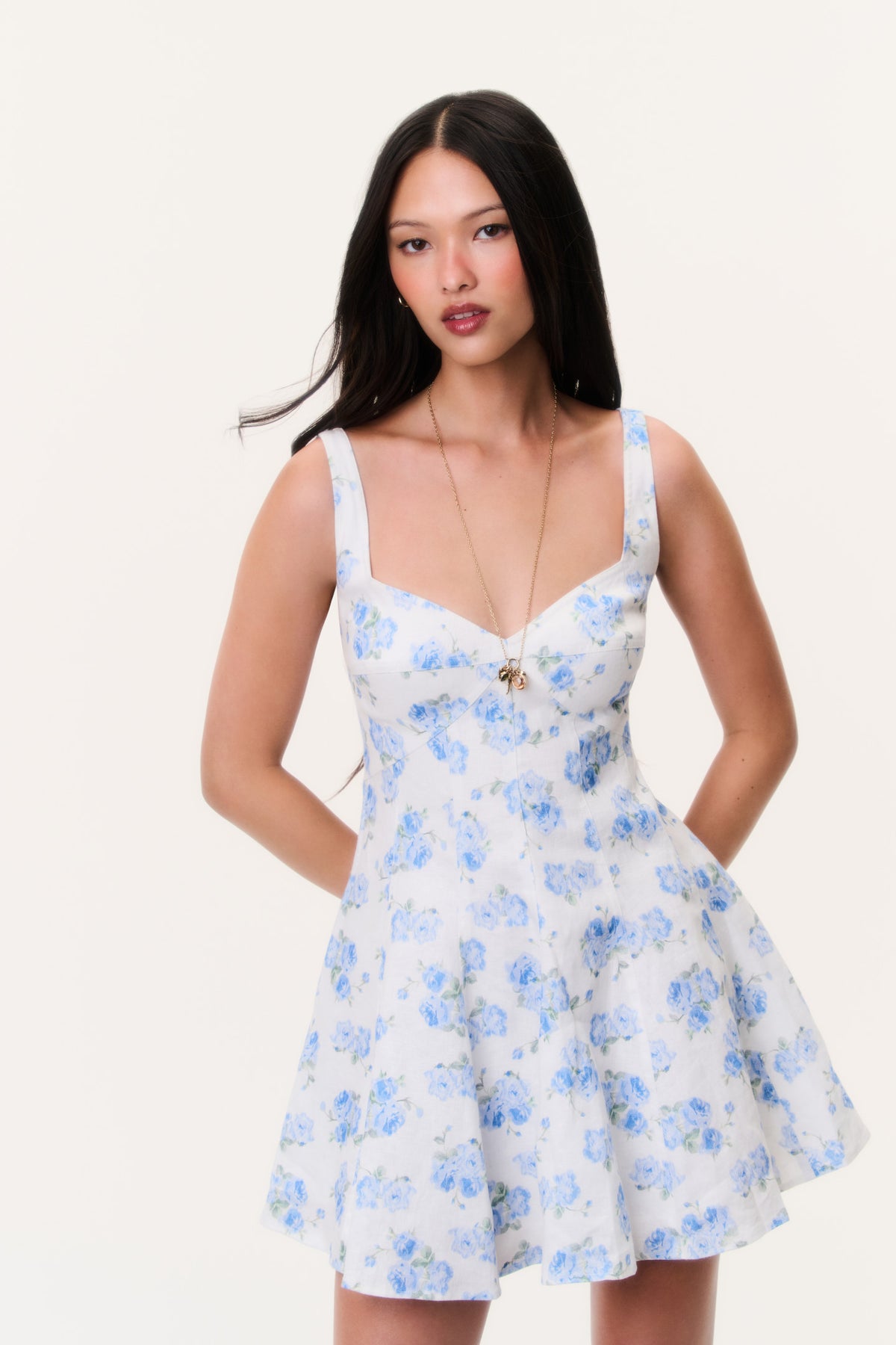 Nabi linen floral mini dress in light blue with V-neck and spaghetti straps, flared skirt