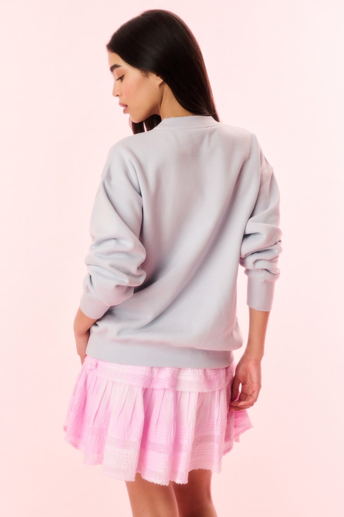 Light lavender pullover sweatshirt back view with ribbed crew neckline and cuffs