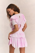 Pink mini dress with back ruffles and layered tiered skirt