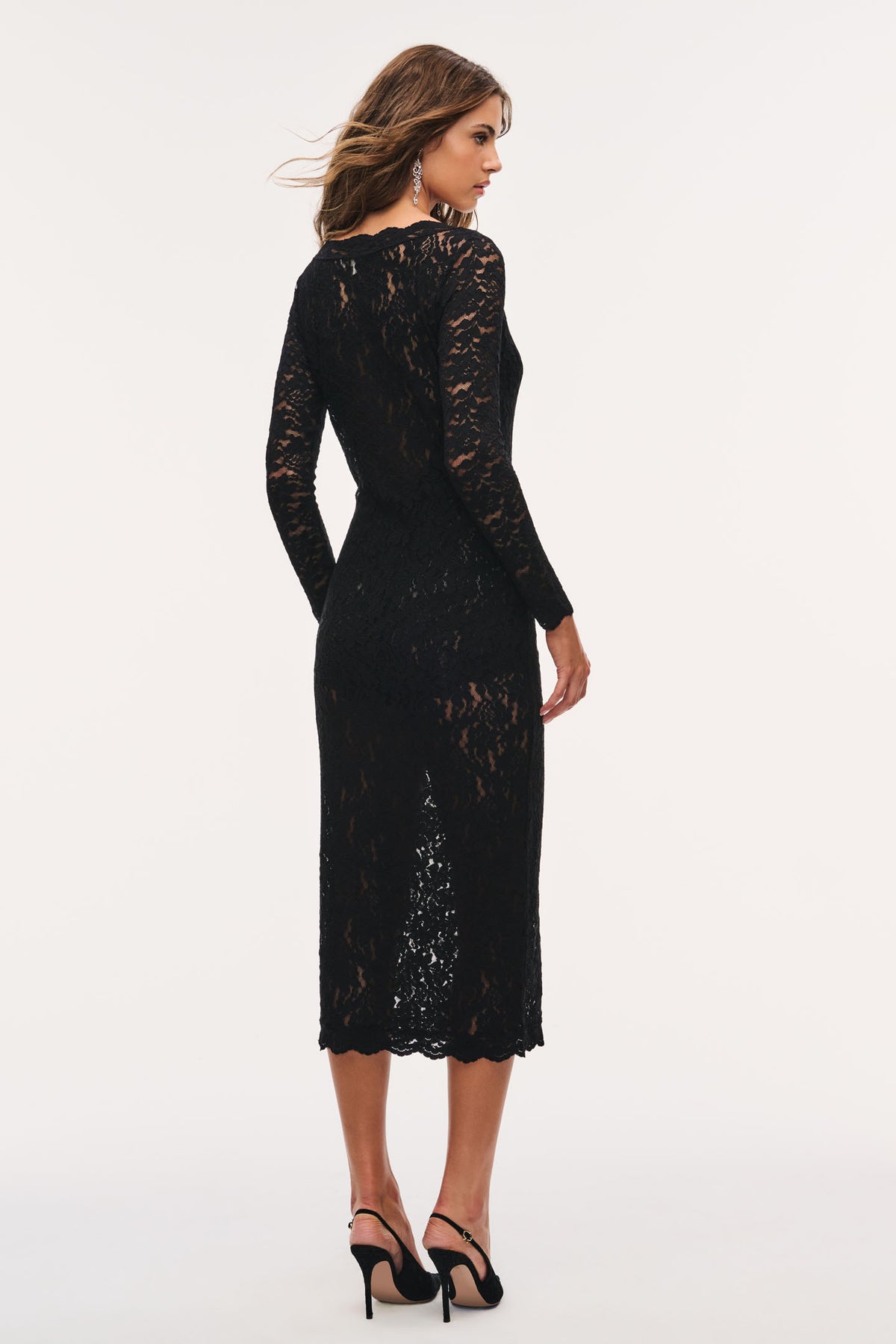 Black stretch lace midi dress, back view with long sleeves and fitted lace hem