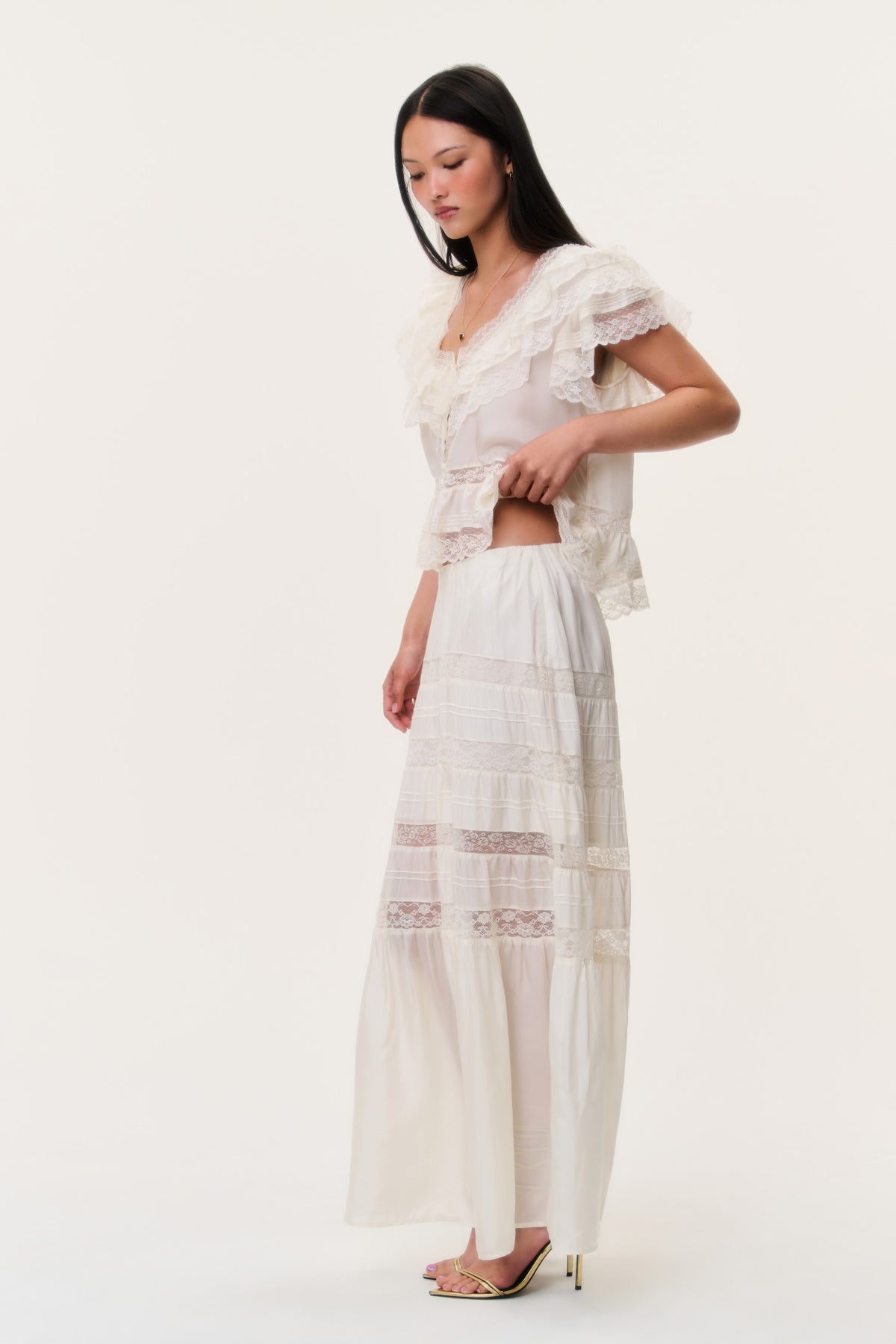 Ivory silk lace maxi skirt, side view, layered tiers with lace trim