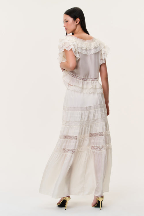 Ivory silk lace maxi skirt with fluttery ruffle tiers and lace bands, back view