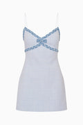 Light blue tweed mini dress with denim trim, spaghetti straps, bow at bust