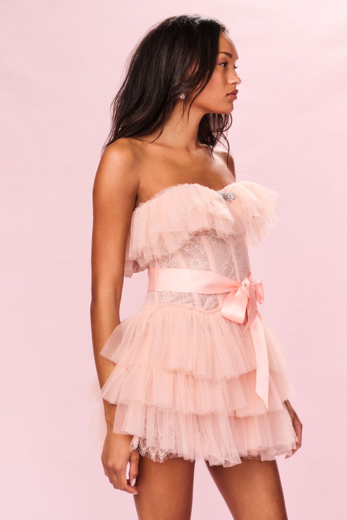 Rose tulle mini dress, strapless bandeau with tiered skirt and waist bow (side view)