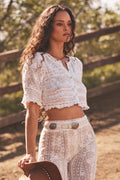 White cotton Victorian crop top with scalloped lace hem and short puff sleeves