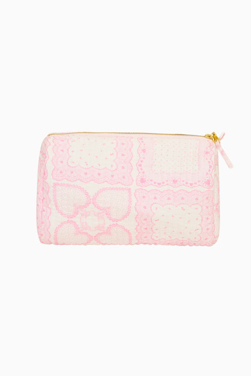 Pink lace Octavia pouch with heart patchwork, gold zipper and tie pull