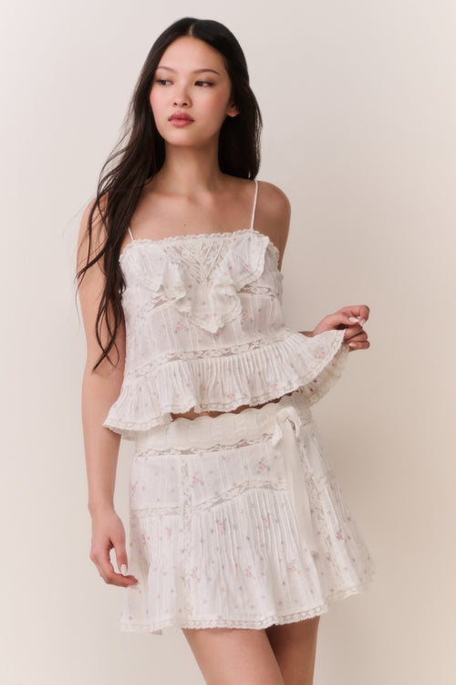 Floral embroidered cotton top with layered ruffles and thin spaghetti straps, light cream