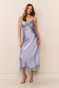 Light blue silk-blend maxi dress with spaghetti straps, knotted bodice, and lace hem