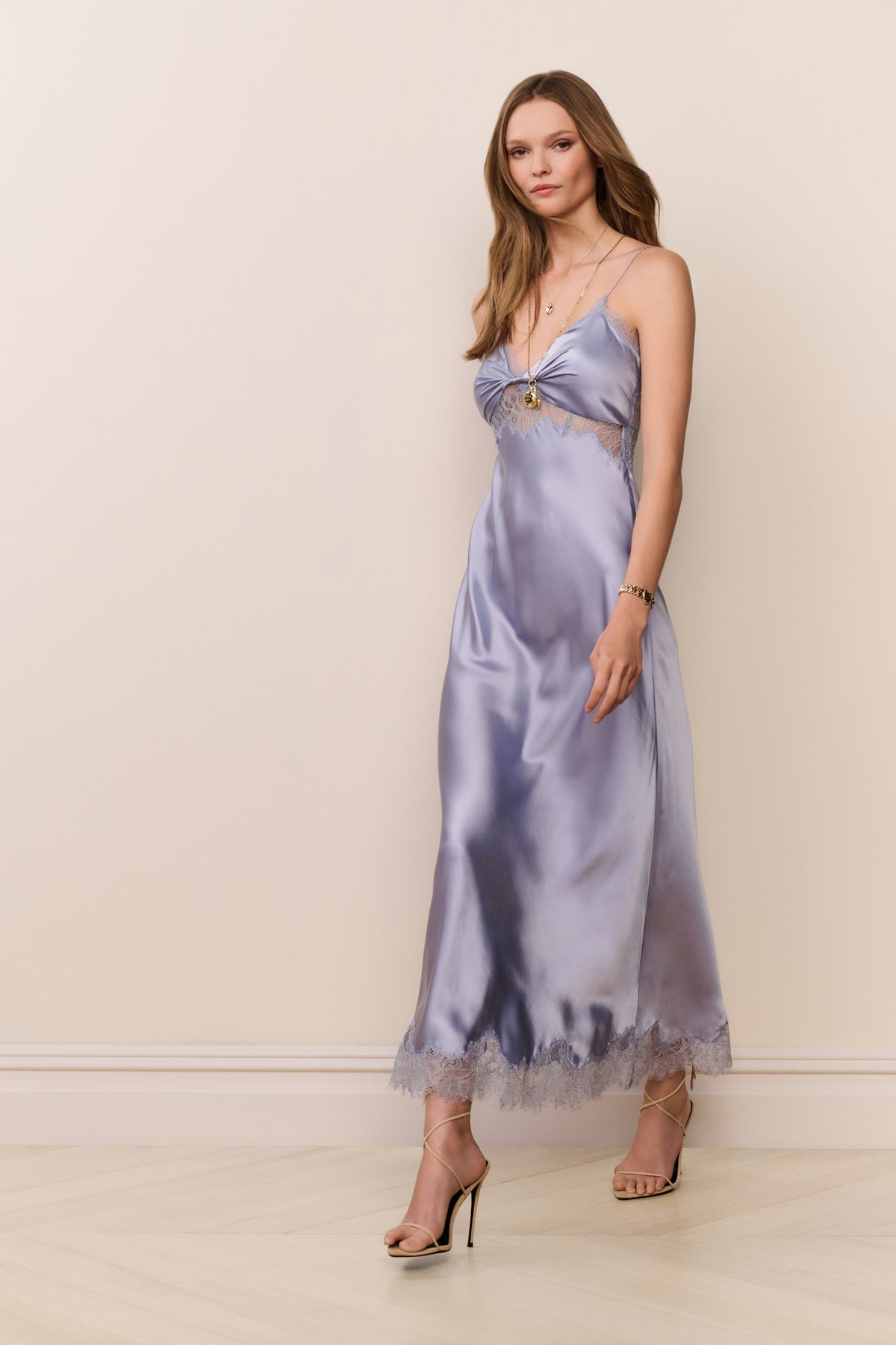 Light blue satin maxi dress with knotted bodice and lace-trim hem