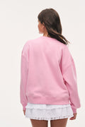 Pink tween varsity pullover sweatshirt, crew neck and long sleeves, back view