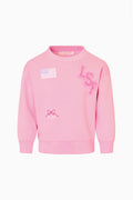 Pink tween varsity pullover sweatshirt with embroidered letters and small patch details