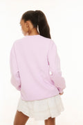 Lavender pullover sweatshirt, back view, with relaxed long sleeves and ribbed cuffs