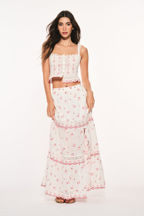 Optic white cotton maxi skirt with red cherry print and scalloped ruffle tiers