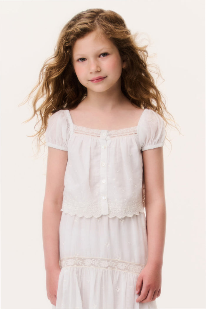 Ivory girls cotton lace top close-up with square neckline, puff sleeves, front buttons