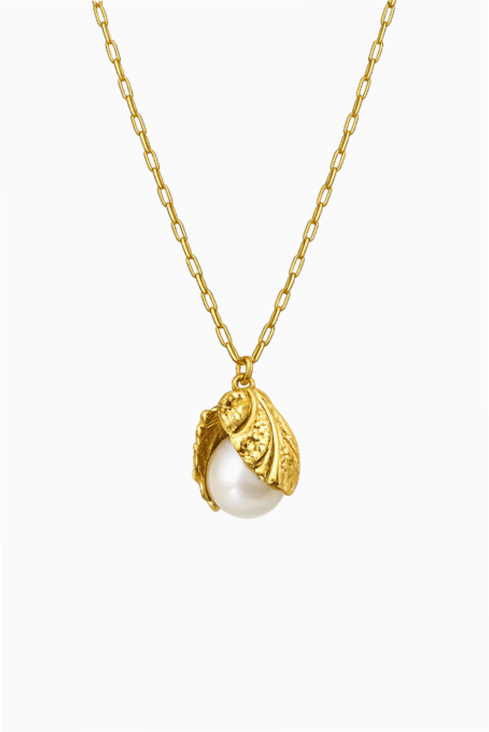 Gold clam shell pearl necklace with curved shell pendant on link chain