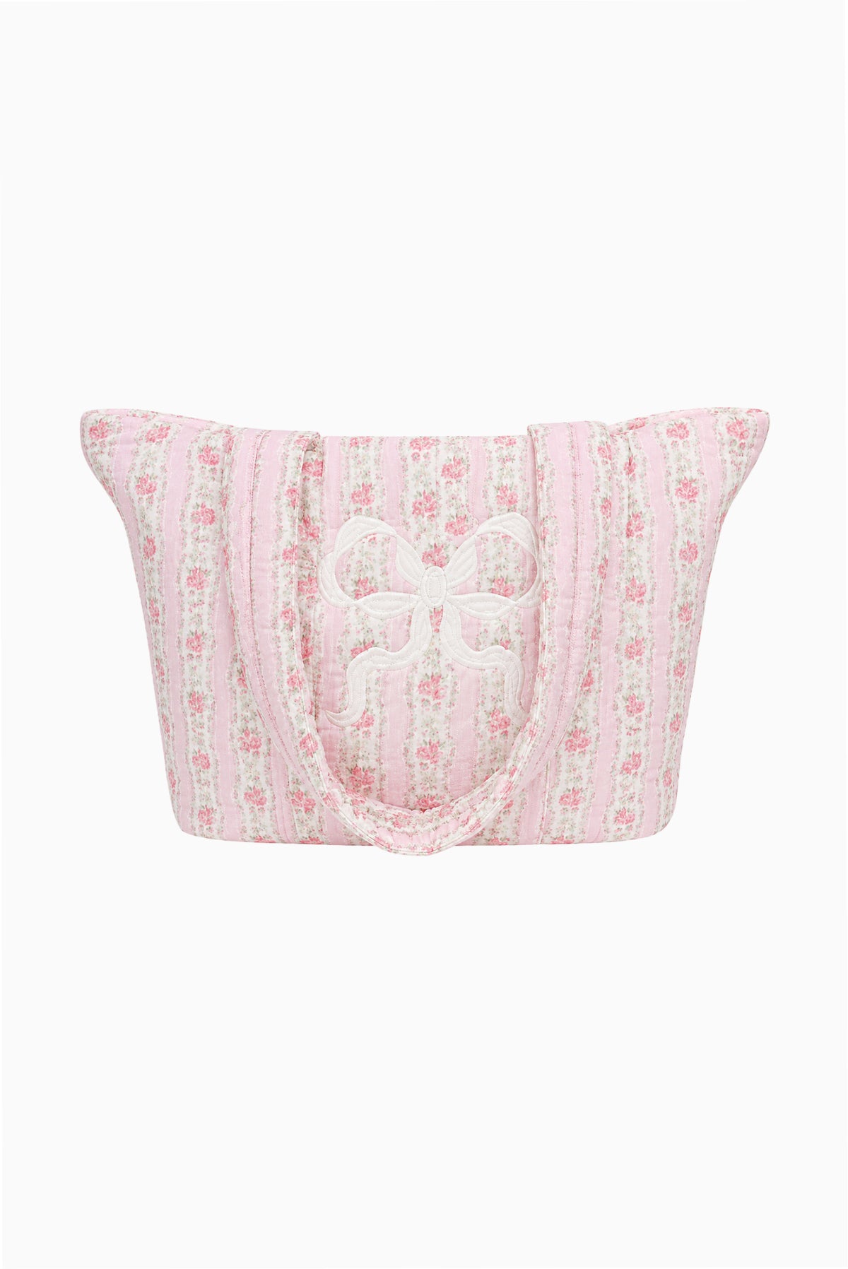 Quilted cotton tote bag in light pink with floral pattern and bow detail