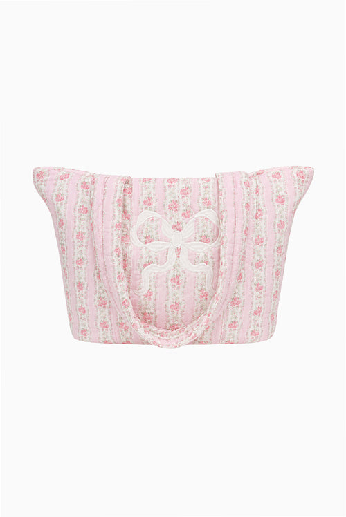 Quilted cotton tote bag in light pink with floral pattern and bow detail