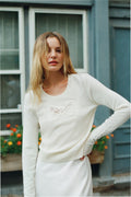Ivory lace bow wool sweater with chest lace detail and long sleeves