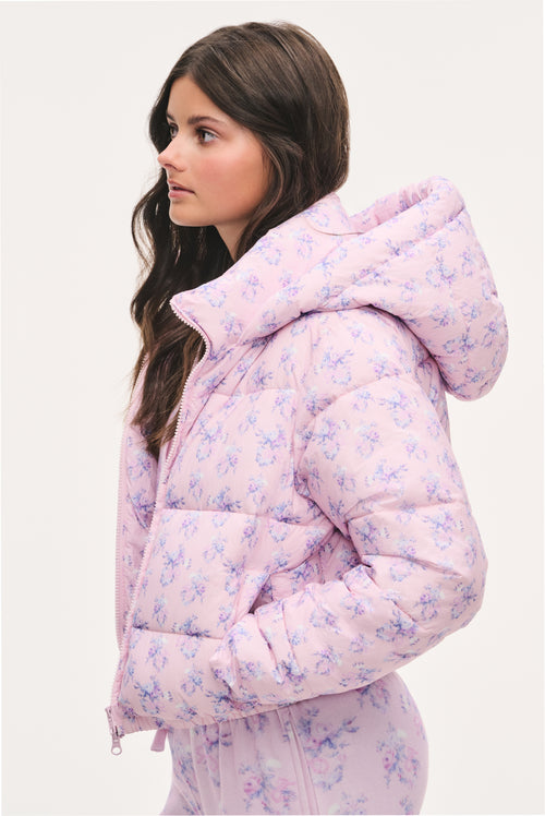 Tween lilac floral puffer jacket with hood, front zipper, and side pockets