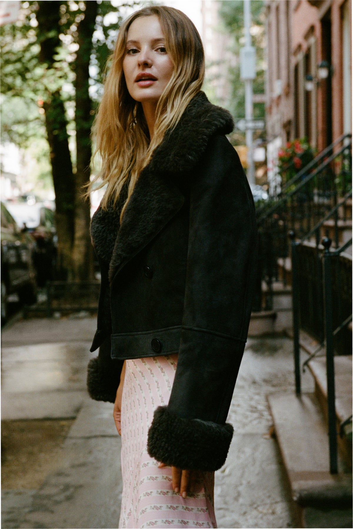 Dark graphite cropped shearling jacket with plush fur collar and button front