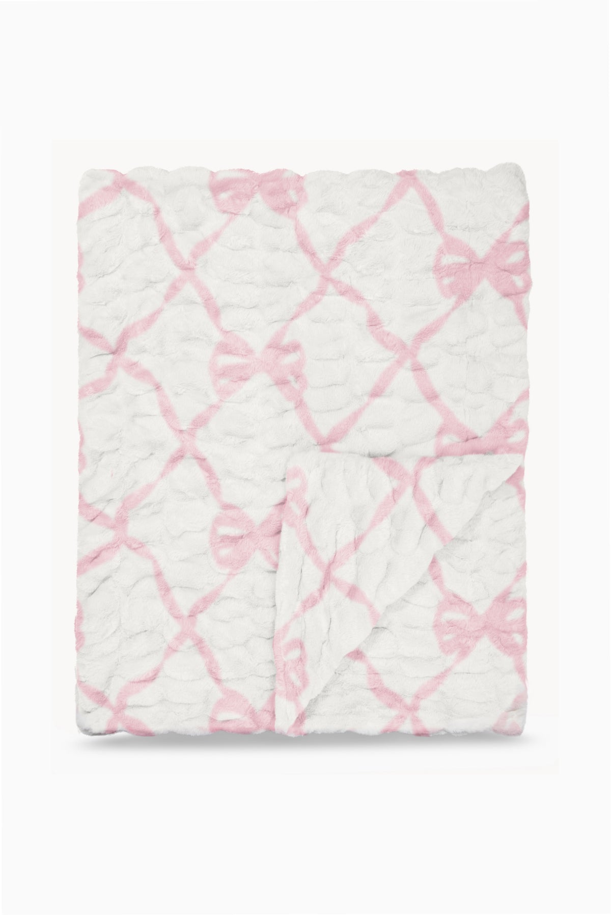 Folded fleece-style blanket with pink bow lattice pattern on white background