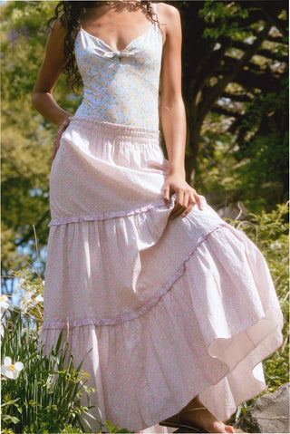 Pink patterned tiered maxi skirt with fluttering ruffle hem