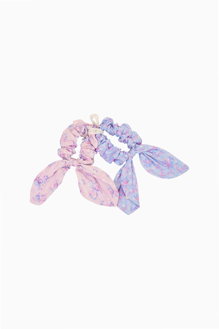 Floral scrunchie set with pastel purple and blue scrunchies, tied bow tails