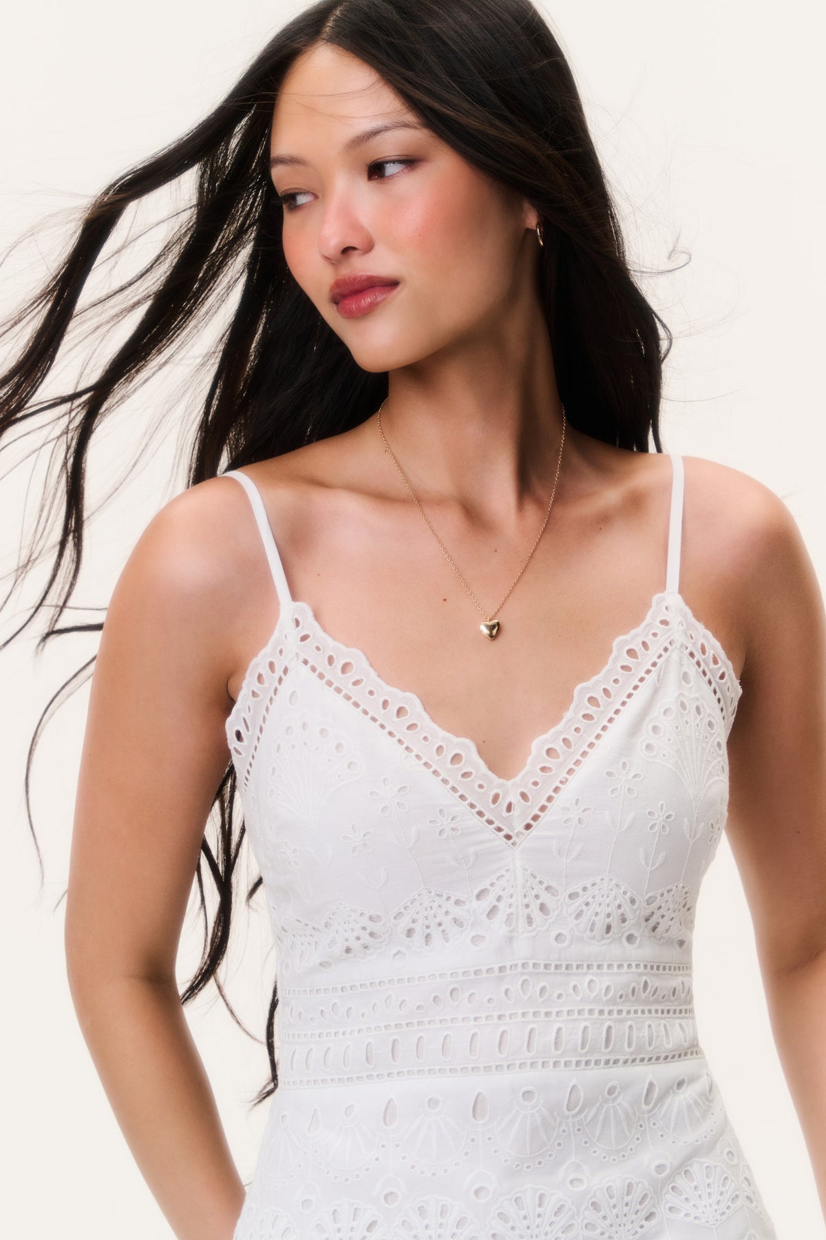 Eyelet cotton mini dress bodice detail with scalloped lace trim and thin straps