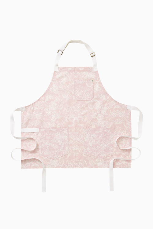 Perennial pink printed apron, front flat lay with adjustable straps and ties - Customized