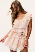 Petal peach silk mini skirt with tiered ruffles and lace trim