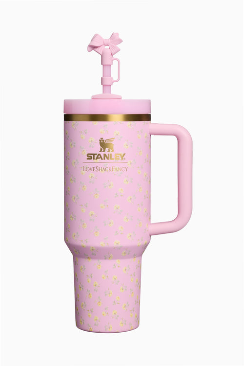 Pink Stanley Quencher tumbler with straw spout, handle, gold rim and floral pattern