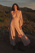 Light pink silk maxi dress with lace V-neck and flowing maxi skirt