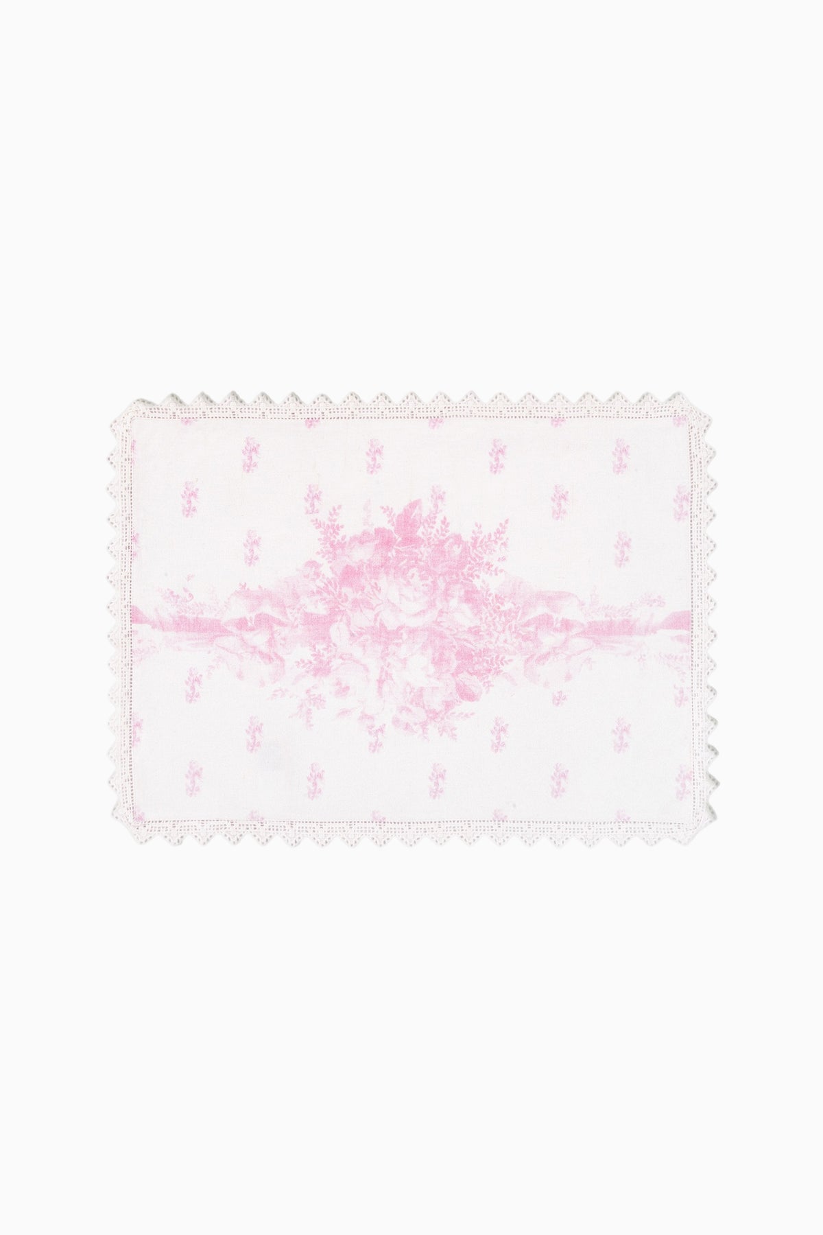 Pink floral place mat with scalloped lace edge and Victorian-style pattern