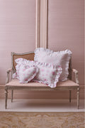 Rosewater embroidered euro pillow with white ruffle edge and lattice bow stitching