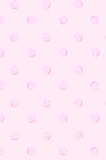 Close-up of pink bow pattern fabric for active dress