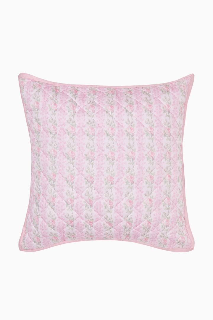 Quilted pink-and-white floral pillow with squared corners